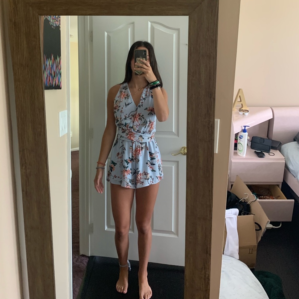 blue romper with ties that can be styled any way